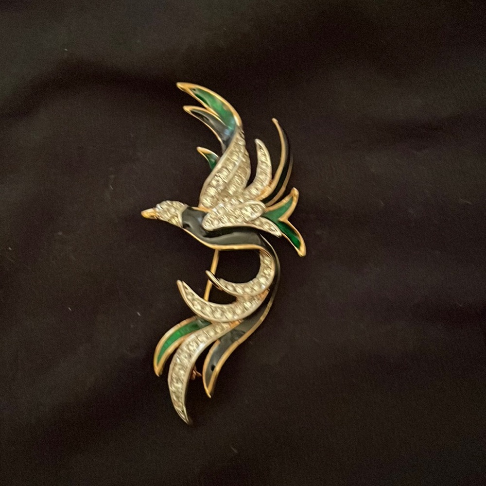 Enamel and pave gold bird in flight brooch